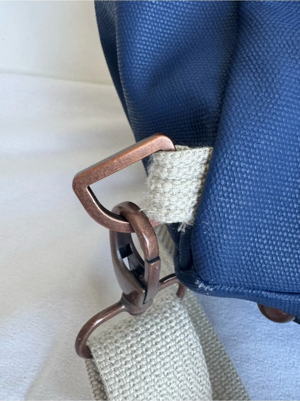 Petunia Pickle Bottom Boxy Backpack Diaper Bag in a geometric cream, navy, teal